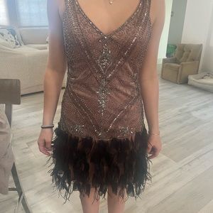 Size 4 black & pink embellished feather dress